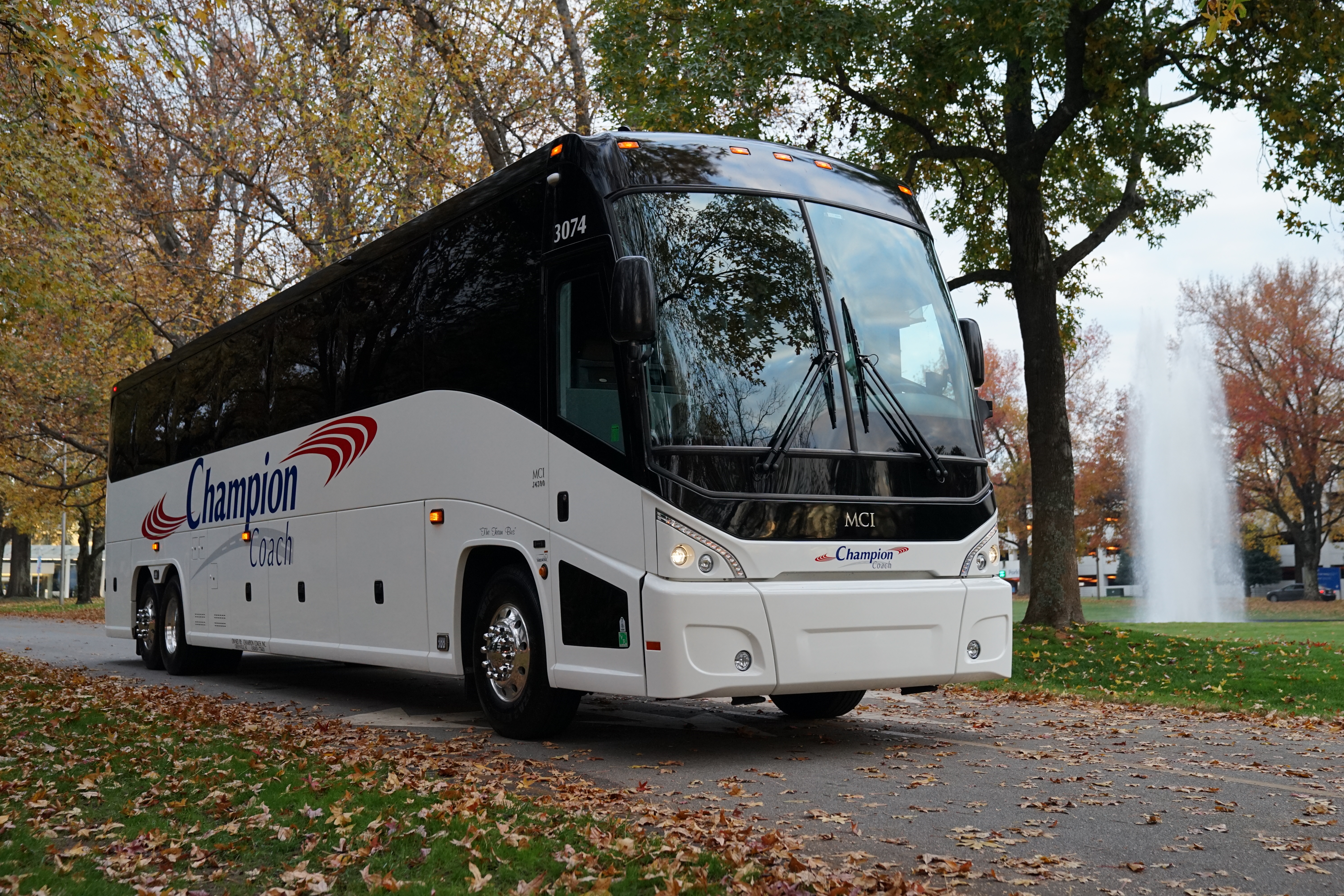 champion-coach-charter-bus-airport-fall